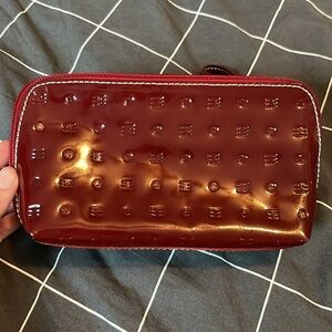 Arcadia patent deep red clutch leather bag made in Italy